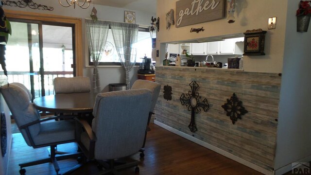 dining area with dark wood finished floors