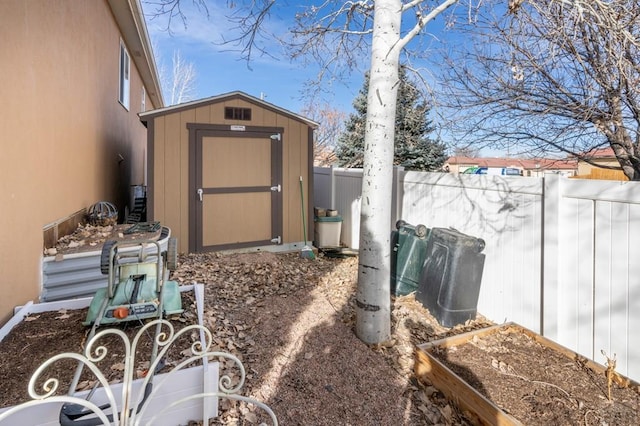 1700 Aquila Dr, Pueblo, CO 81008 - view of shed with a fenced backyard