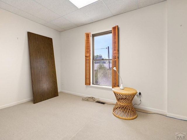 215 E Pitkin Ave, Pueblo, CO 81004 - unfurnished room featuring carpet flooring and a drop ceiling
