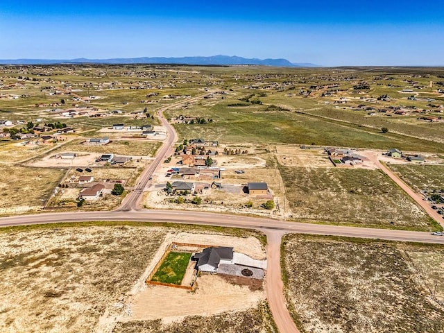 1207 N Jon Ln, Pueblo West, CO 81007 - aerial view of a mountain backdrop