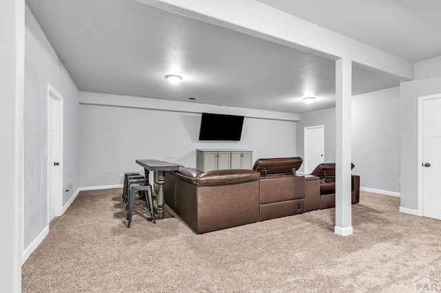 1207 N Jon Ln, Pueblo West, CO 81007 - carpeted living room with baseboards