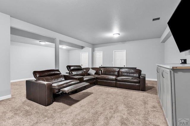 1207 N Jon Ln, Pueblo West, CO 81007 - carpeted living area featuring baseboards