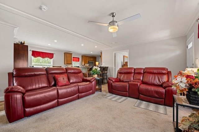 999 Fortino Blvd Unit 237, Pueblo, CO 81008 - living area featuring light carpet, ornamental molding, a ceiling fan, and recessed lighting
