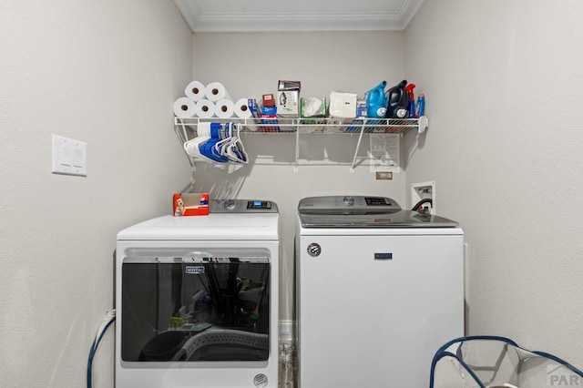 999 Fortino Blvd Unit 237, Pueblo, CO 81008 - laundry area featuring independent washer and dryer and crown molding