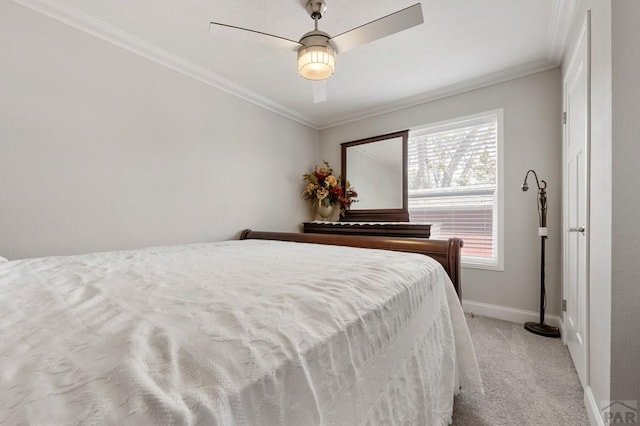 999 Fortino Blvd Unit 237, Pueblo, CO 81008 - bedroom with light colored carpet, ornamental molding, baseboards, and a ceiling fan