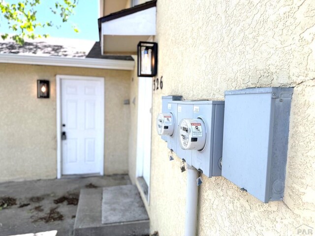 326 W Golden Eagle Way Unit 328, Pueblo West, CO 81007 - view of exterior entry featuring stucco siding
