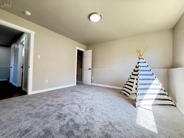 326 W Golden Eagle Way Unit 328, Pueblo West, CO 81007 - interior space featuring carpet floors and baseboards