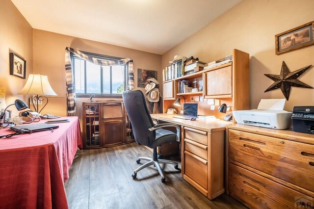 office space with dark wood finished floors