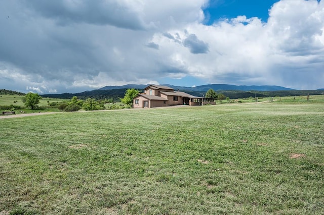 view of mountain feature featuring a rural view