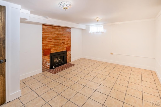 below grade area with a fireplace and baseboards