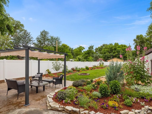 view of yard featuring a patio, a fenced backyard, and a pergola