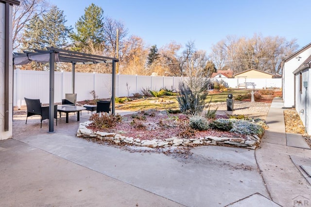 view of yard featuring a fire pit, a patio, a fenced backyard, and a pergola