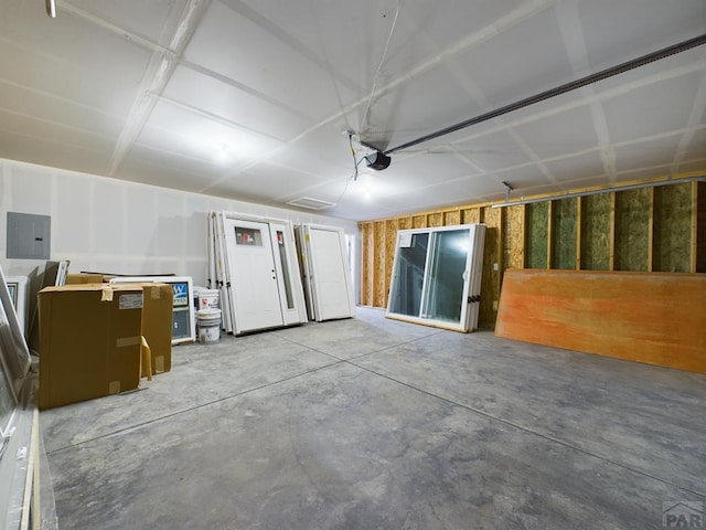 151 S Stardust Cir, Pueblo West, CO 81007 - garage with a garage door opener and electric panel