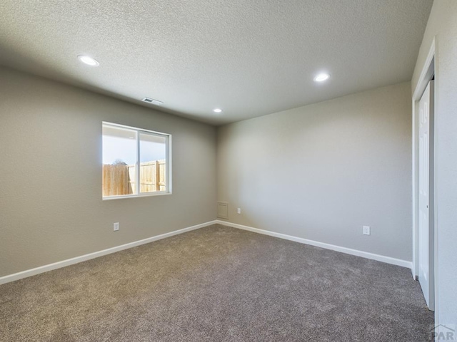151 S Stardust Cir, Pueblo West, CO 81007 - carpeted empty room with visible vents, baseboards, and recessed lighting