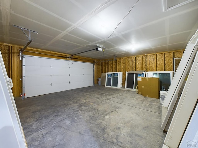 151 S Stardust Cir, Pueblo West, CO 81007 - garage featuring a garage door opener