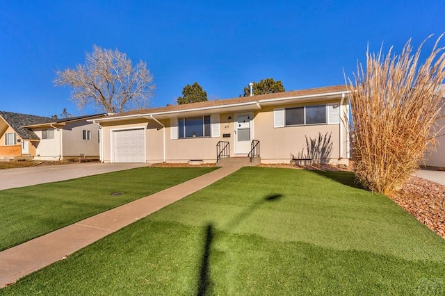 ranch-style house featuring a garage, a front yard, driveway, and stucco siding