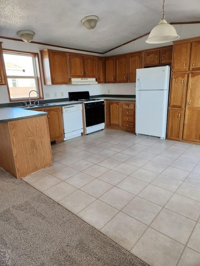 kitchen featuring brown cabinetry, white appliances, hanging light fixtures, and under cabinet range hood