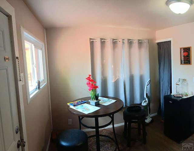 dining space with baseboards