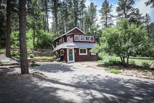 8570 Pine Dr, Beulah, CO 81023 - rustic home with a metal roof