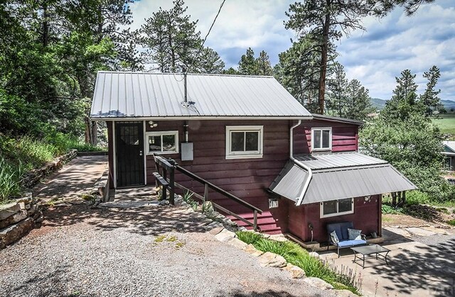 8570 Pine Dr, Beulah, CO 81023 - rear view of property with a metal roof