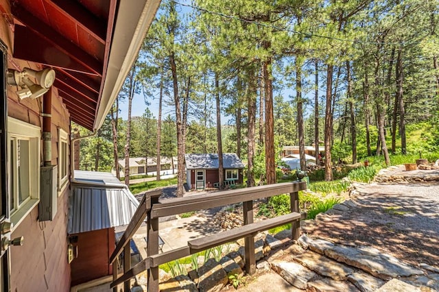 8570 Pine Dr, Beulah, CO 81023 - deck with an outbuilding