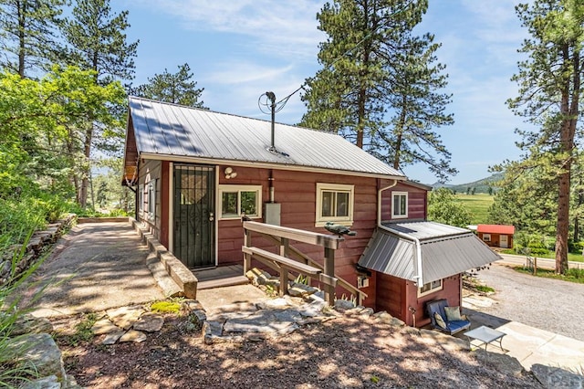 8570 Pine Dr, Beulah, CO 81023 - chalet / cabin featuring a metal roof