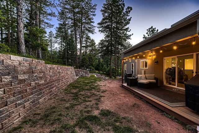 view of yard featuring a deck