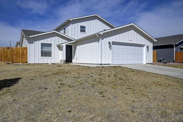 1436 Brewery Rd, Pueblo, CO 81001 - modern inspired farmhouse featuring board and batten siding, an attached garage, concrete driveway, and fence