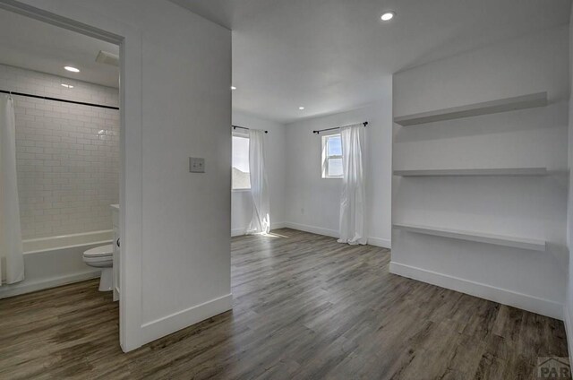 1436 Brewery Rd, Pueblo, CO 81001 - interior space featuring baseboards, wood finished floors, and recessed lighting
