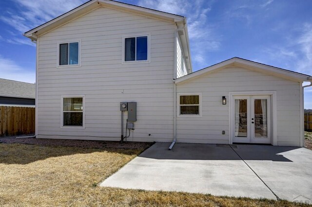 1436 Brewery Rd, Pueblo, CO 81001 - back of house with french doors, a patio, and fence