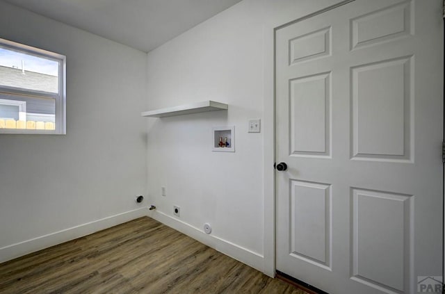 1436 Brewery Rd, Pueblo, CO 81001 - washroom featuring hookup for a washing machine, hookup for an electric dryer, baseboards, dark wood-type flooring, and laundry area