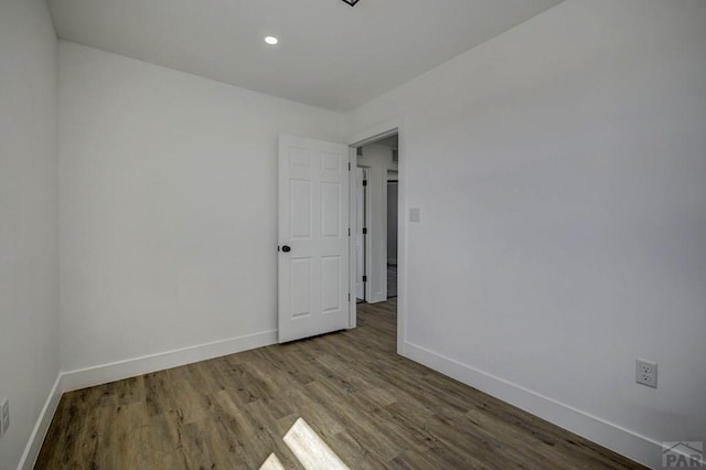 1436 Brewery Rd, Pueblo, CO 81001 - unfurnished room featuring recessed lighting, wood finished floors, and baseboards