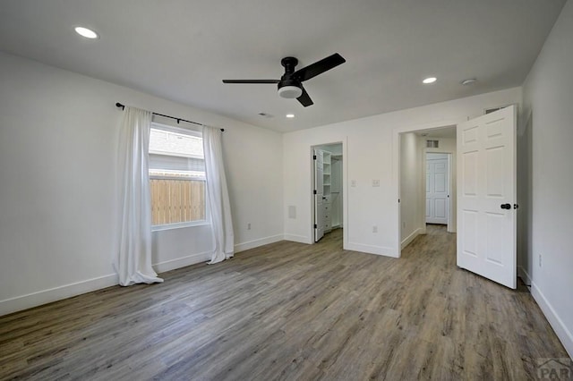 1436 Brewery Rd, Pueblo, CO 81001 - unfurnished bedroom featuring recessed lighting, wood finished floors, and baseboards