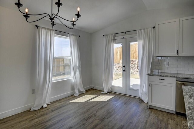 1436 Brewery Rd, Pueblo, CO 81001 - doorway with french doors, vaulted ceiling, baseboards, a notable chandelier, and wood finished floors