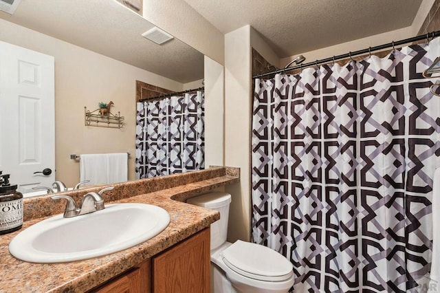 7470 Sun Prairie Dr, Fountain, CO 80925 - full bathroom featuring vanity, a textured ceiling, and a shower with shower curtain