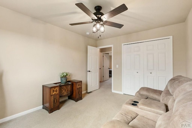 7470 Sun Prairie Dr, Fountain, CO 80925 - living area featuring light colored carpet and ceiling fan