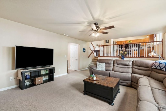 7470 Sun Prairie Dr, Fountain, CO 80925 - living room with ceiling fan, light carpet, and stairs
