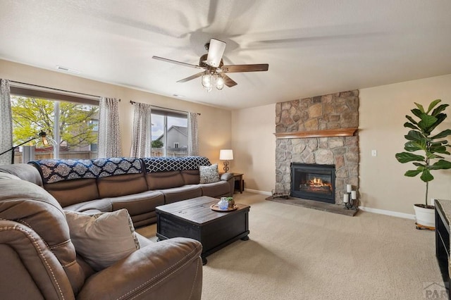 7470 Sun Prairie Dr, Fountain, CO 80925 - living room featuring ceiling fan, a fireplace, and carpet flooring