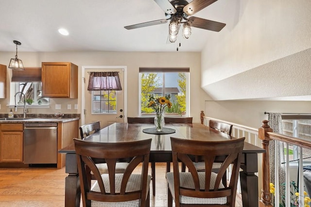 7470 Sun Prairie Dr, Fountain, CO 80925 - dining space with a ceiling fan, plenty of natural light, and light wood-style flooring