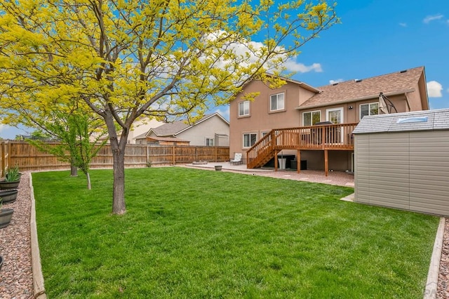 7470 Sun Prairie Dr, Fountain, CO 80925 - fenced backyard featuring stairway, a deck, and a storage shed