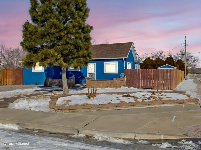 view of front of home with fence