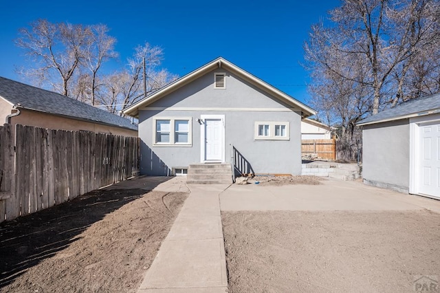 1609 Euclid Ave, Pueblo, CO 81004 - rear view of property featuring stucco siding and fence