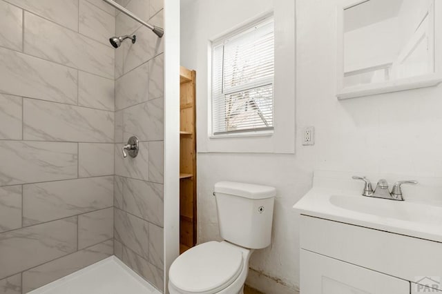 1609 Euclid Ave, Pueblo, CO 81004 - full bath featuring vanity, toilet, and tiled shower