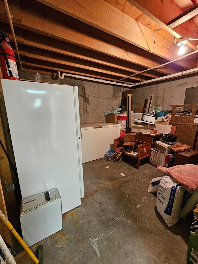 743 G St, Two Buttes, CO 81084 - unfinished basement with freestanding refrigerator