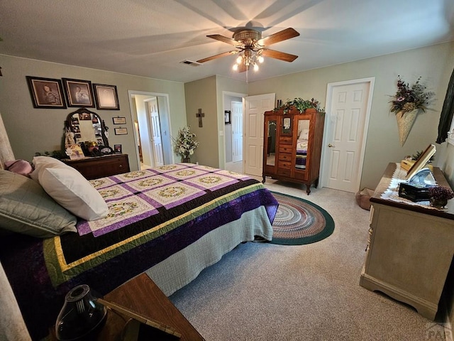 743 G St, Two Buttes, CO 81084 - bedroom featuring light carpet and a ceiling fan