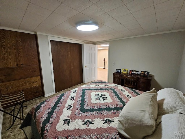 743 G St, Two Buttes, CO 81084 - carpeted bedroom with crown molding