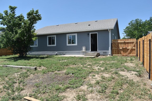1417 Bradish Ave, La Junta, CO 81050 - back of property with a gate