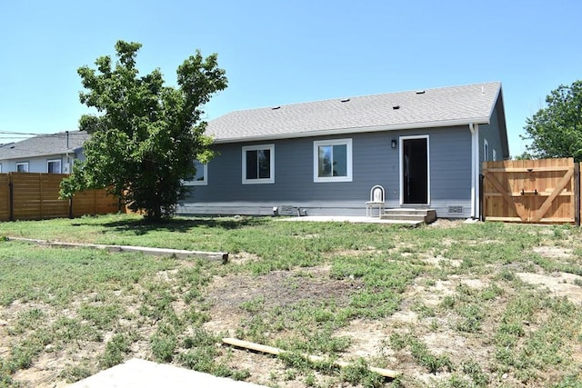 1417 Bradish Ave, La Junta, CO 81050 - rear view of property featuring a gate