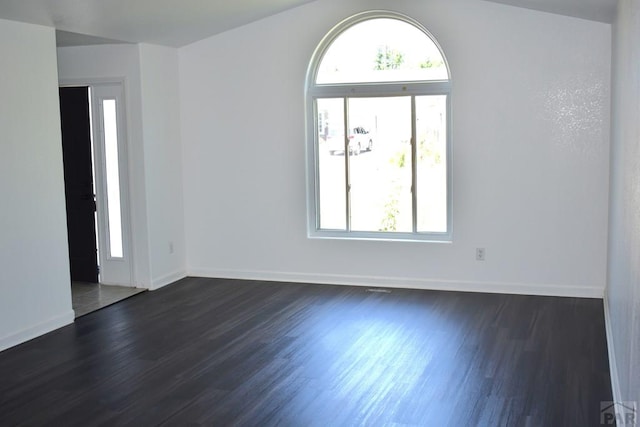 1417 Bradish Ave, La Junta, CO 81050 - empty room with dark wood-style flooring and baseboards