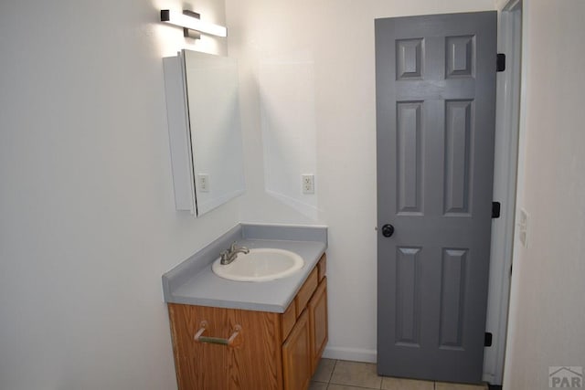 1417 Bradish Ave, La Junta, CO 81050 - bathroom with vanity and tile patterned floors